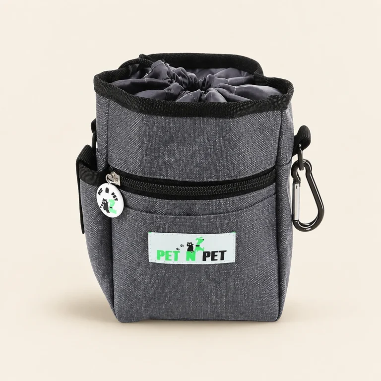Gray dog treat training pouch with built-in poop bag dispenser, drawstring closure and metal carabiner clip