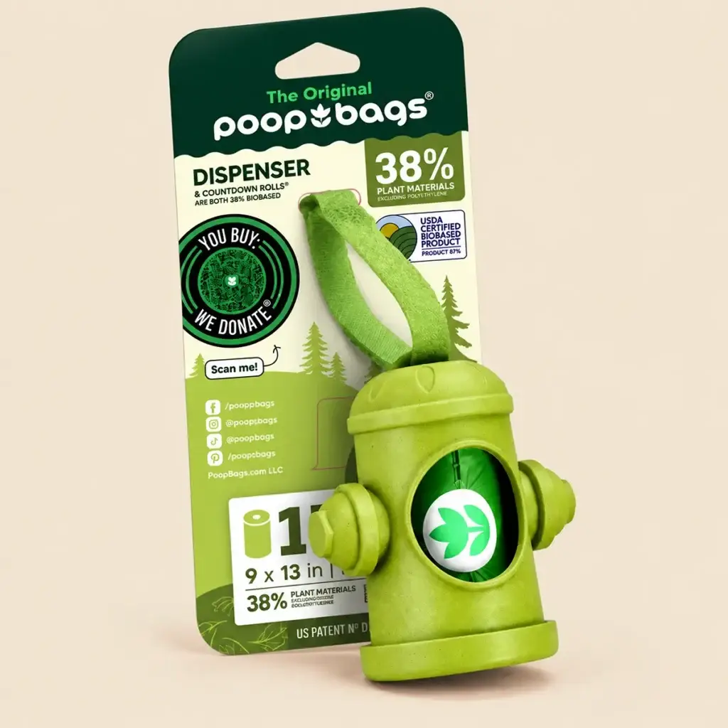 Green dog poop bag dispenser with leash strap and retail packaging